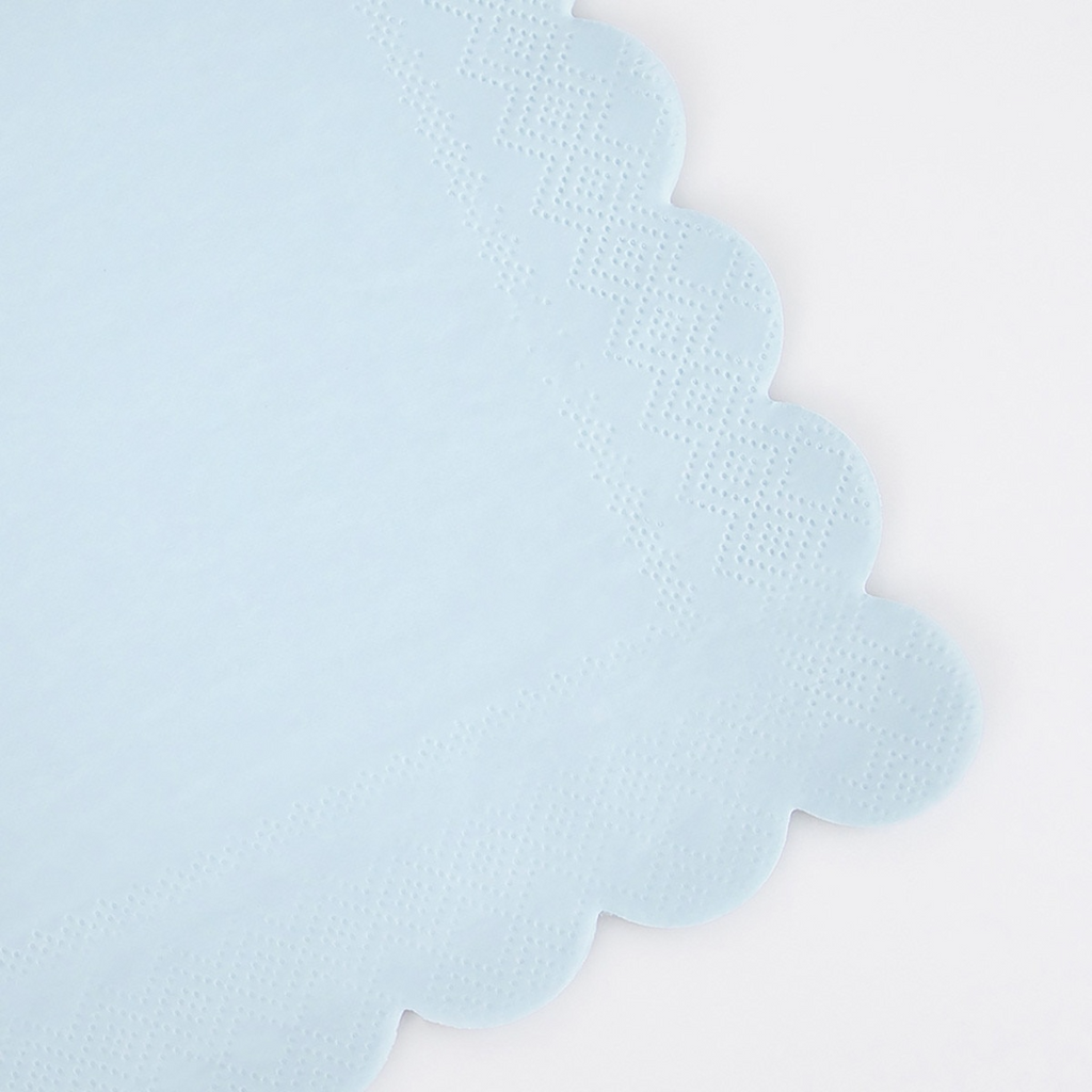 Light blue napkin with scalloped edge for birthday event from Parte Haus party supply store in Bethesda MD.