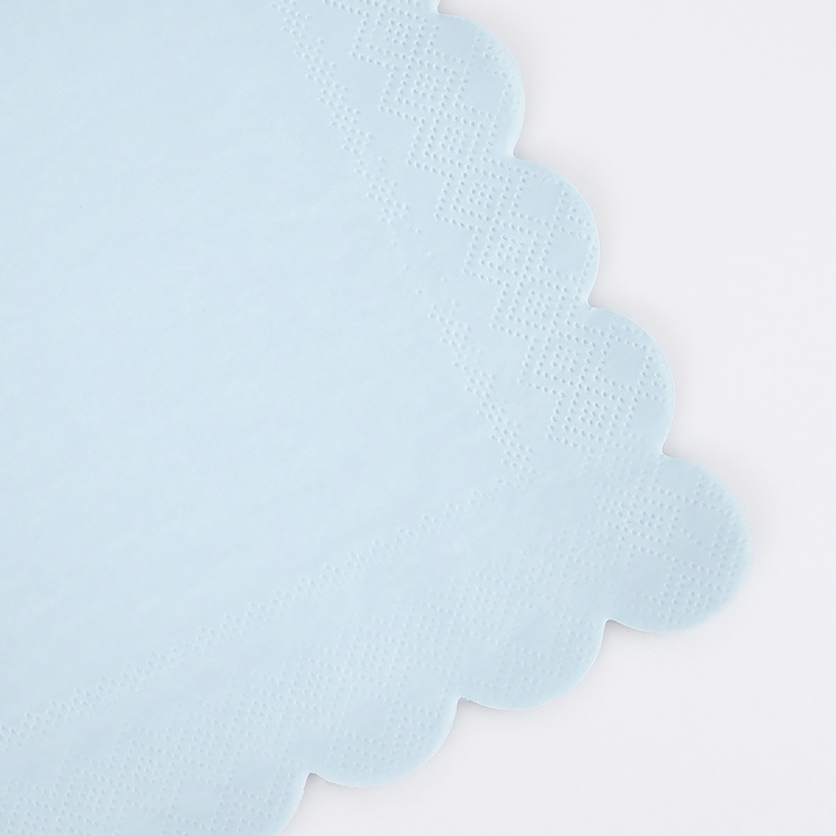 Light blue napkin with scalloped edge for birthday event from Parte Haus party supply store in Bethesda MD.
