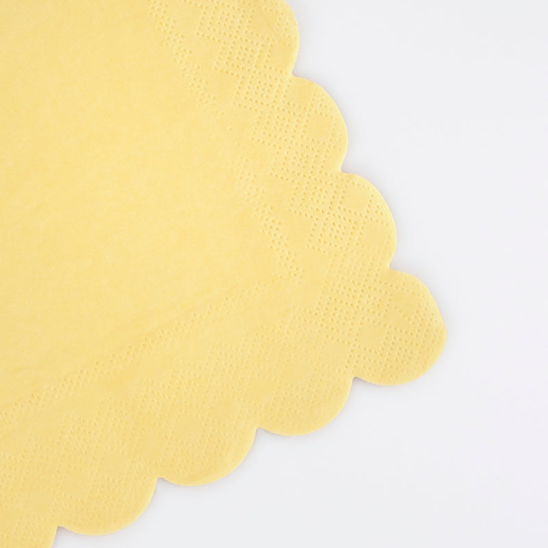 Yellow scalloped napkin with textured border for birthday from Parte Haus party supply store in Bethesda MD