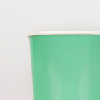 Green paper cup with white rim for celebrations from Parte Haus party supply store in Bethesda MD