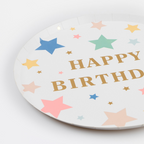 White happy birthday plate with colorful star print for birthday parties from Parte Haus party supply store in Bethesda Maryland