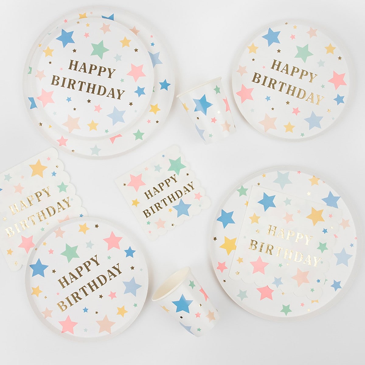 Pastel multicolor happy birthday plates cups napkins star pattern birthday set from Parte Haus party supply store in Bethesda MD