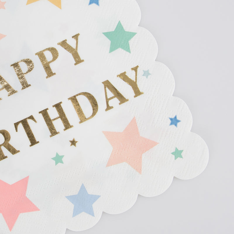 White happy birthday napkin with gold lettering and colorful stars birthday theme from Parte Haus party supply store in Bethesda MD