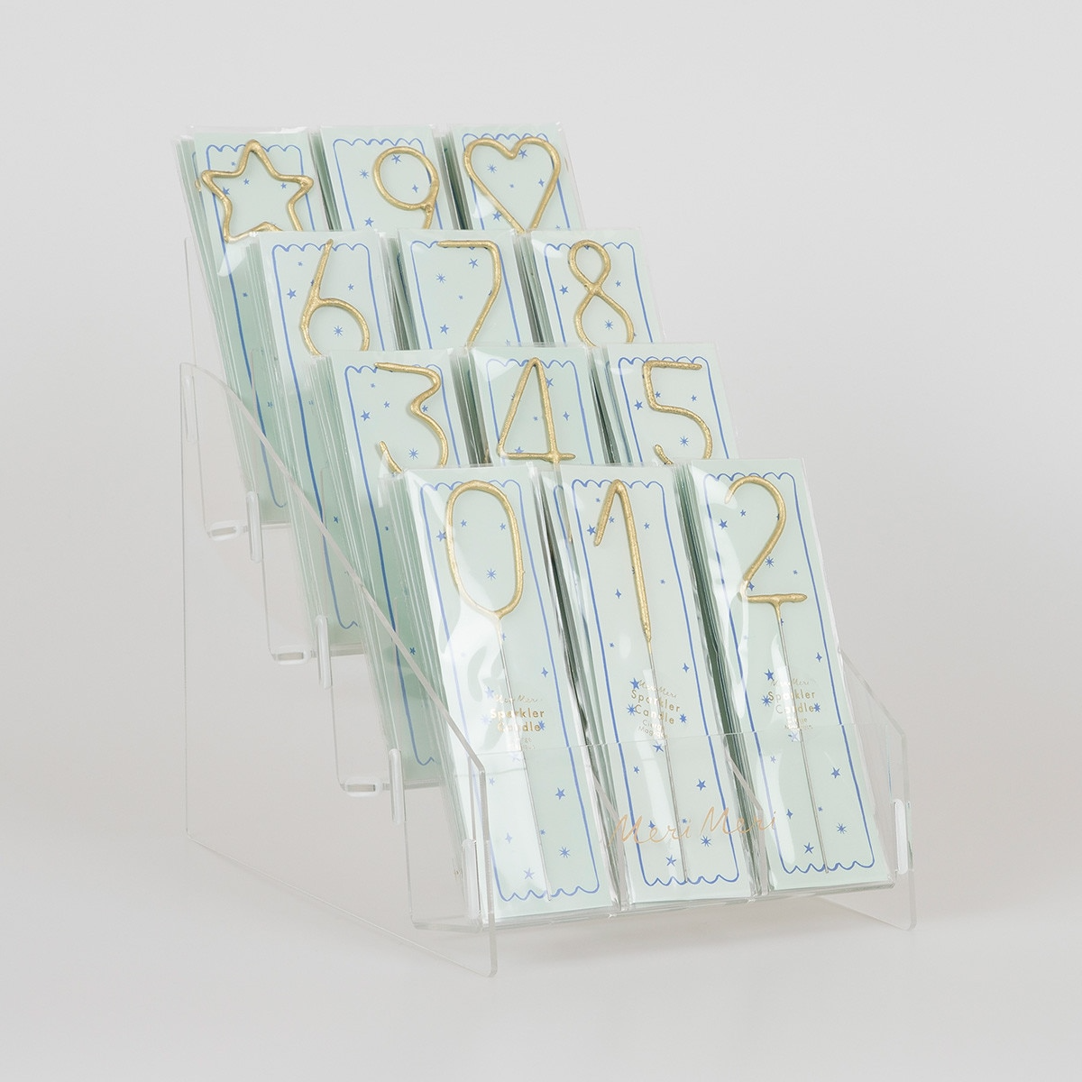 Gold number and shape sparkler candles display for birthdays from Parte Haus party supply store in Bethesda MD