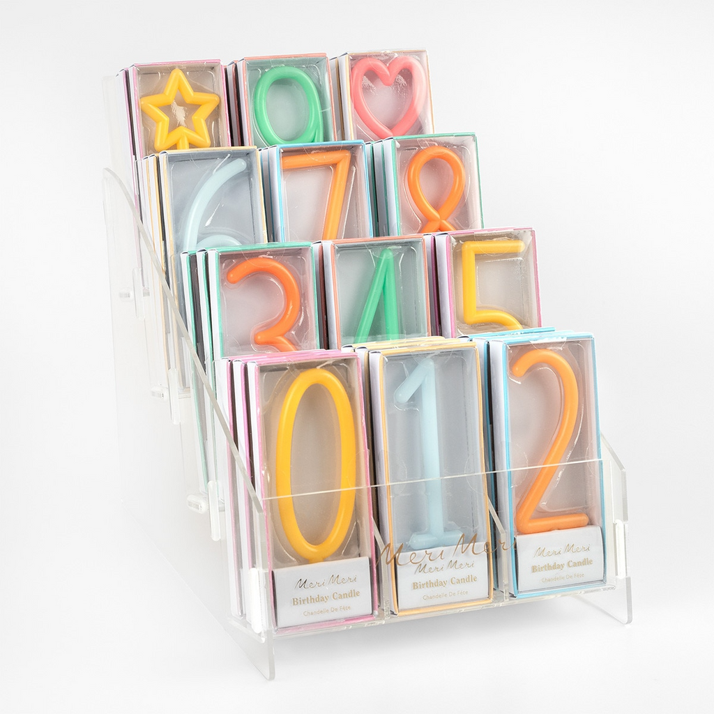 Colorful number and shape birthday candles in boxes for birthday from Parte Haus party supply store in Bethesda Maryland