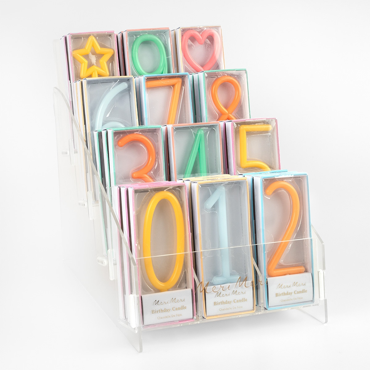Colorful number and shape birthday candles in boxes for birthday from Parte Haus party supply store in Bethesda Maryland