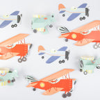 Red blue and mint airplane cupcake wrappers and decorations aviation birthday theme from Parte Haus party supply store in Bethesda MD