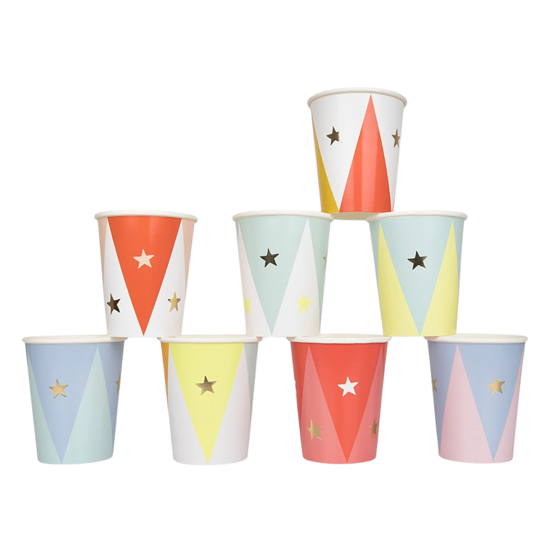 Colorful pastel and red paper cups with star and triangle designs circus theme from Parte Haus party supply store in Bethesda Maryland
