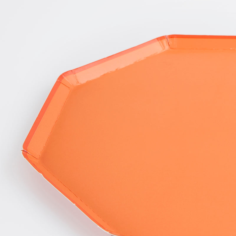 Orange octagon plate with glossy finish for celebrations from Parte Haus party supply store in Bethesda Maryland