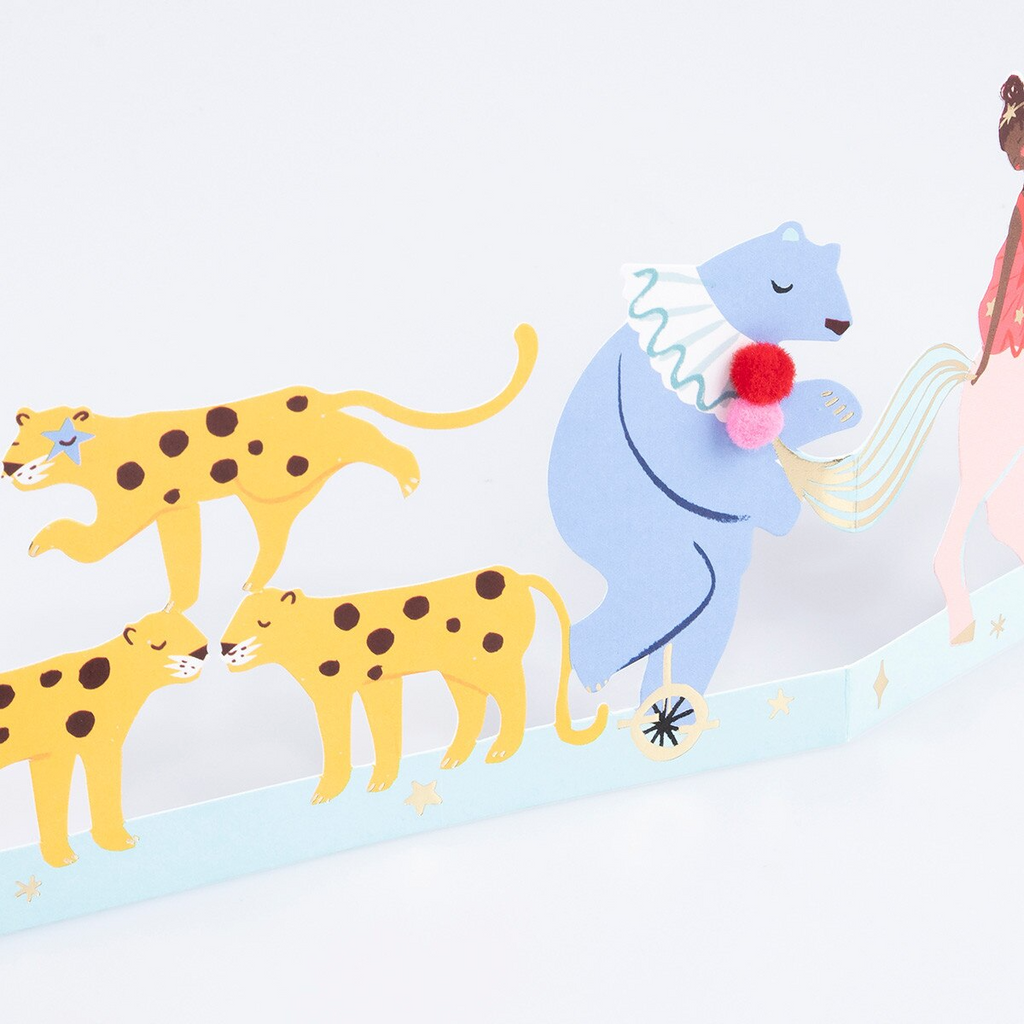 Yellow circus animal garland with leopards and blue bear for kids birthday from Parte Haus party supply store in Bethesda MD