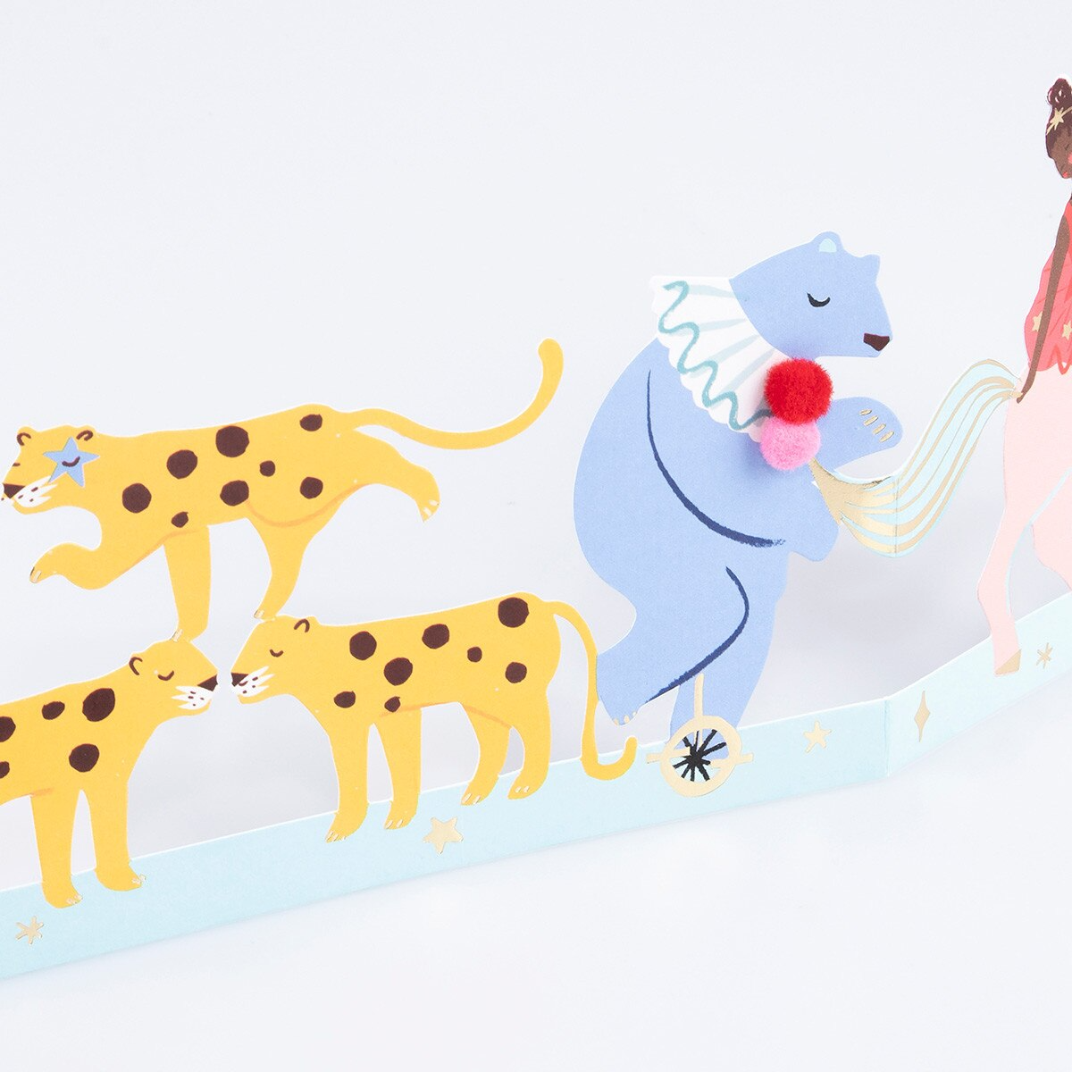 Yellow circus animal garland with leopards and blue bear for kids birthday from Parte Haus party supply store in Bethesda MD