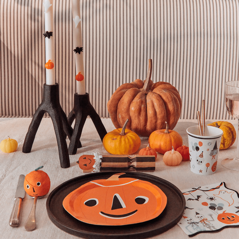 Orange pumpkin shaped plate and Halloween table decor for Halloween from Parte Haus party supply store in Bethesda Maryland