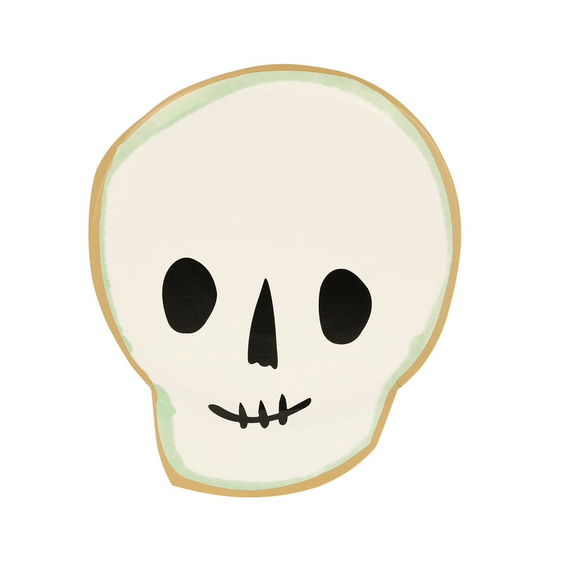 White skull shaped plate with gold trim for Halloween from Parte Haus party supply store in Bethesda Maryland