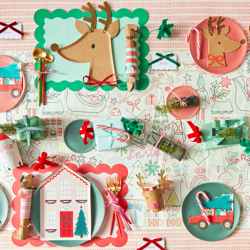 Colorful Christmas reindeer tableware and festive decorations for holiday from Parte Haus party supply store in Bethesda MD