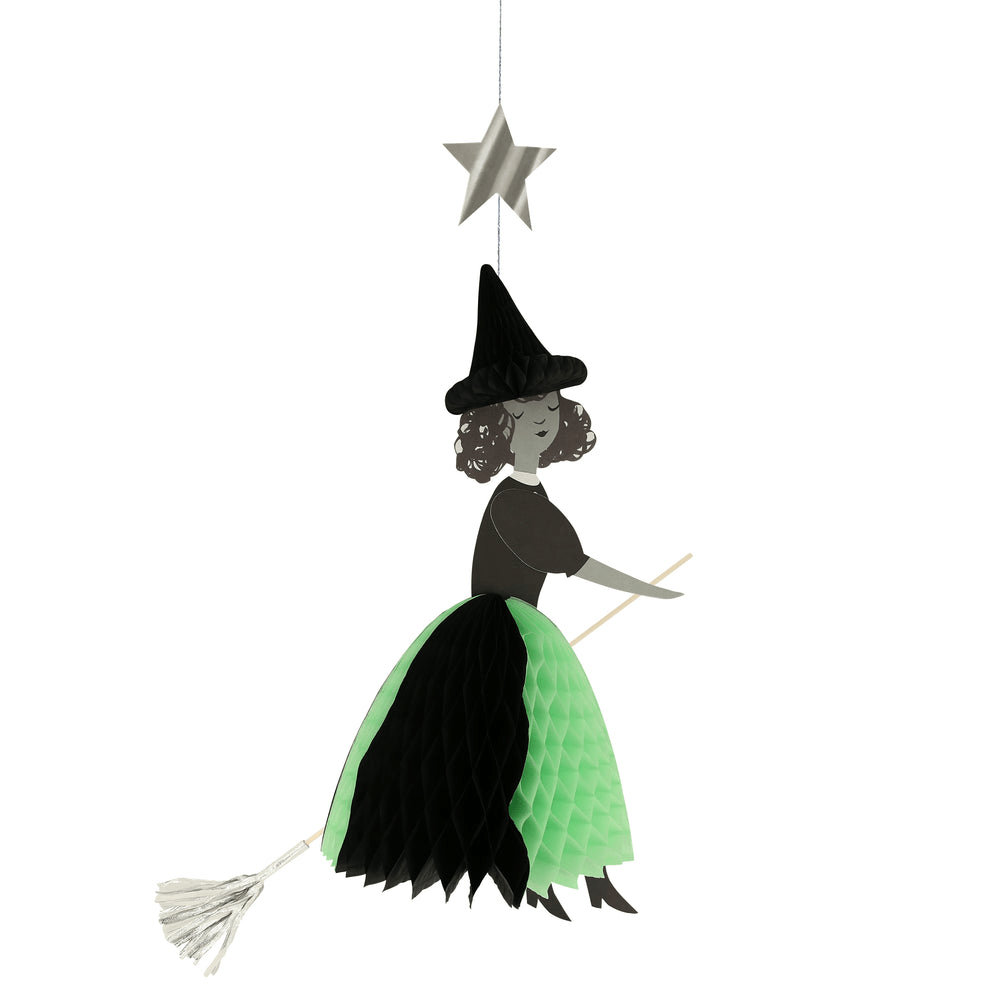 Green and black witch hanging decoration for Halloween from Parte Haus party supply store in Bethesda MD