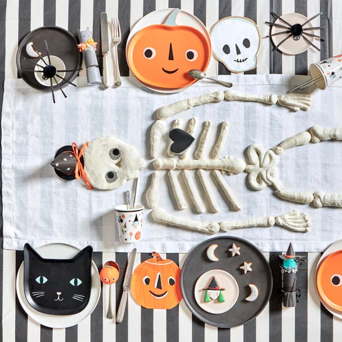 Black orange and white Halloween tableware with pumpkin skull and cat plates for Halloween from Parte Haus party supply store in Bethesda MD