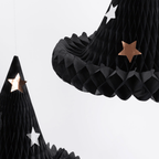 Black honeycomb paper witch hats with metallic and white stars Halloween decor from Parte Haus party supply store in Bethesda MD