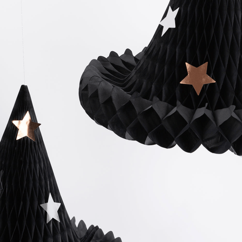Black honeycomb paper witch hats with metallic and white stars Halloween decor from Parte Haus party supply store in Bethesda MD