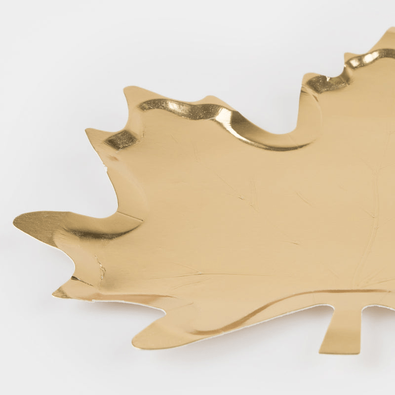 Gold leaf shaped plate with shiny finish for autumn celebrations from Parte Haus party supply store in Bethesda MD.