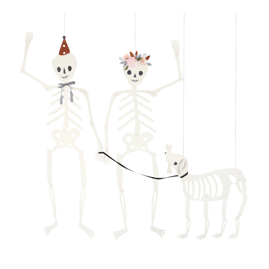White skeleton garland with floral crown and party hat Halloween decoration from Parte Haus party supply store in Bethesda MD