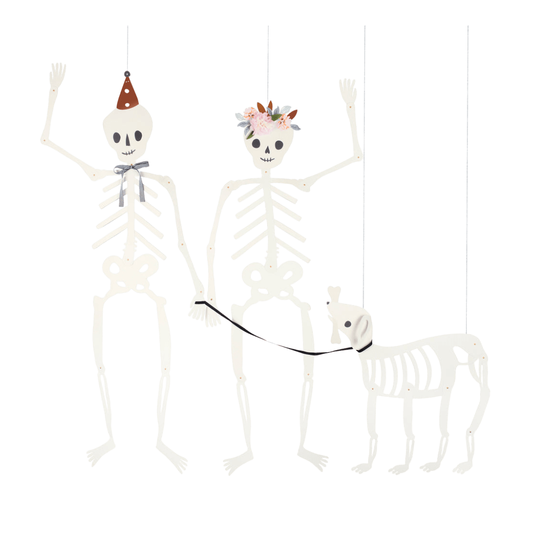 White skeleton garland with floral crown and party hat Halloween decoration from Parte Haus party supply store in Bethesda MD