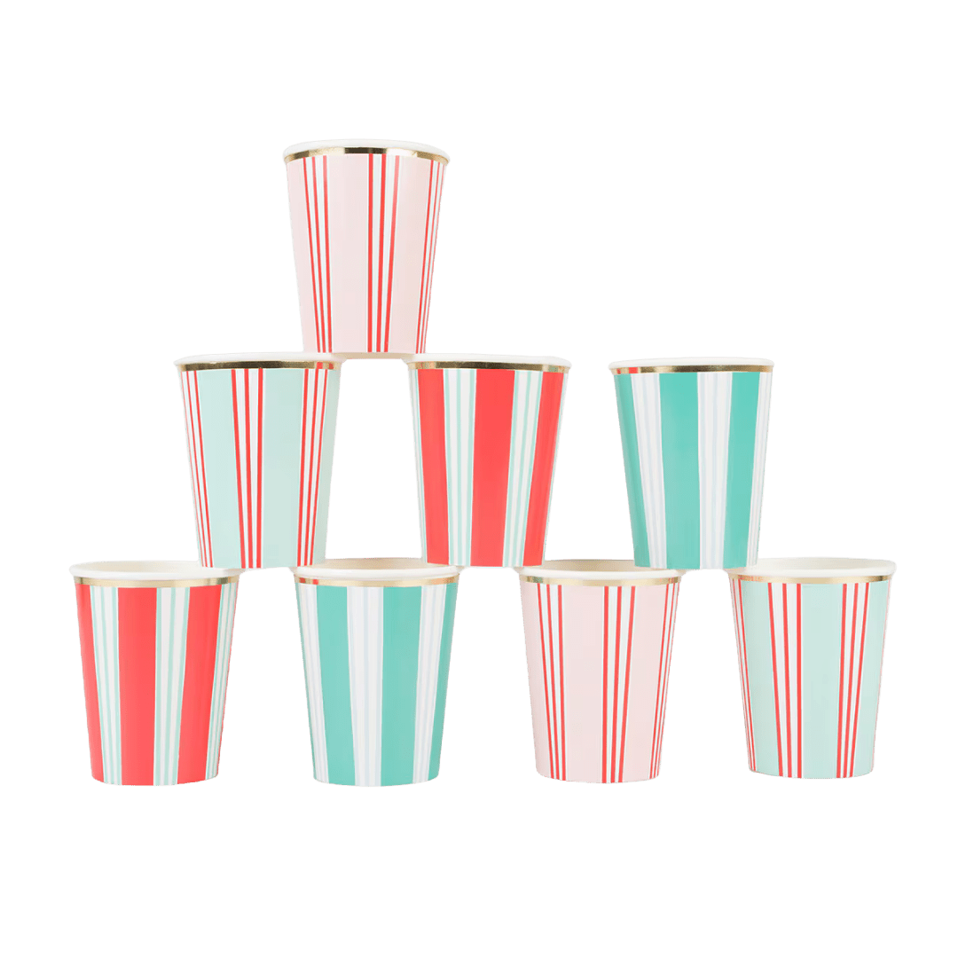 Red and teal striped paper cups with gold rim stack for birthday theme from Parte Haus party supply store in Bethesda Maryland