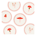 Red and cream mushroom paper plates whimsical woodland birthday theme from Parte Haus party supply store in Bethesda MD.