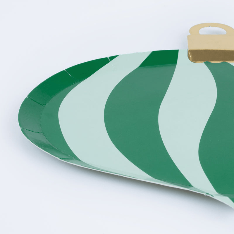 Green and light green ornament shaped plate with gold top Christmas from Parte Haus party supply store in Bethesda MD