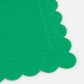 Green scalloped napkin with textured edge for birthday from Parte Haus party supply store in Bethesda Maryland