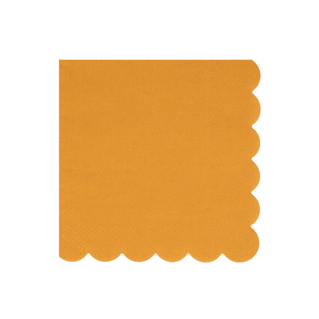 Yellow napkin with scalloped edge for birthday or celebration from Parte Haus party supply store in Bethesda MD.