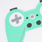 Mint green game controller shaped napkin with sparkly details gamer birthday theme from Parte Haus party supply store in Bethesda MD