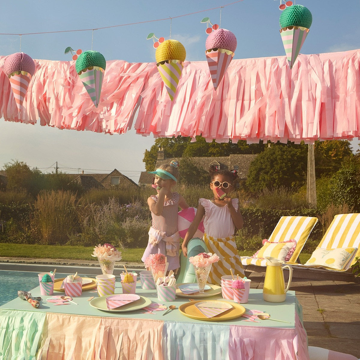 Pastel ice cream garland and tableware for kids summer pool party from Parte Haus party supply store in Bethesda MD