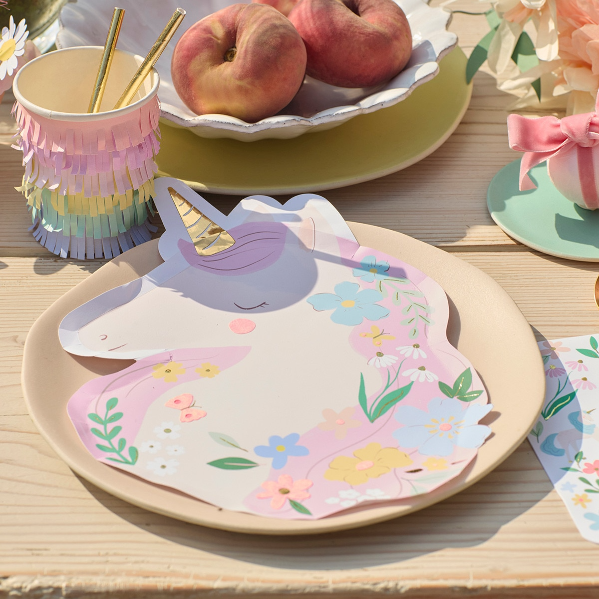 pastel unicorn shaped paper plate with floral design birthday from Parte Haus party supply store in Bethesda MD