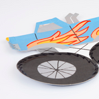 Blue and black monster truck shaped paper plate with flame detail birthday theme from Parte Haus party supply store in Bethesda MD
