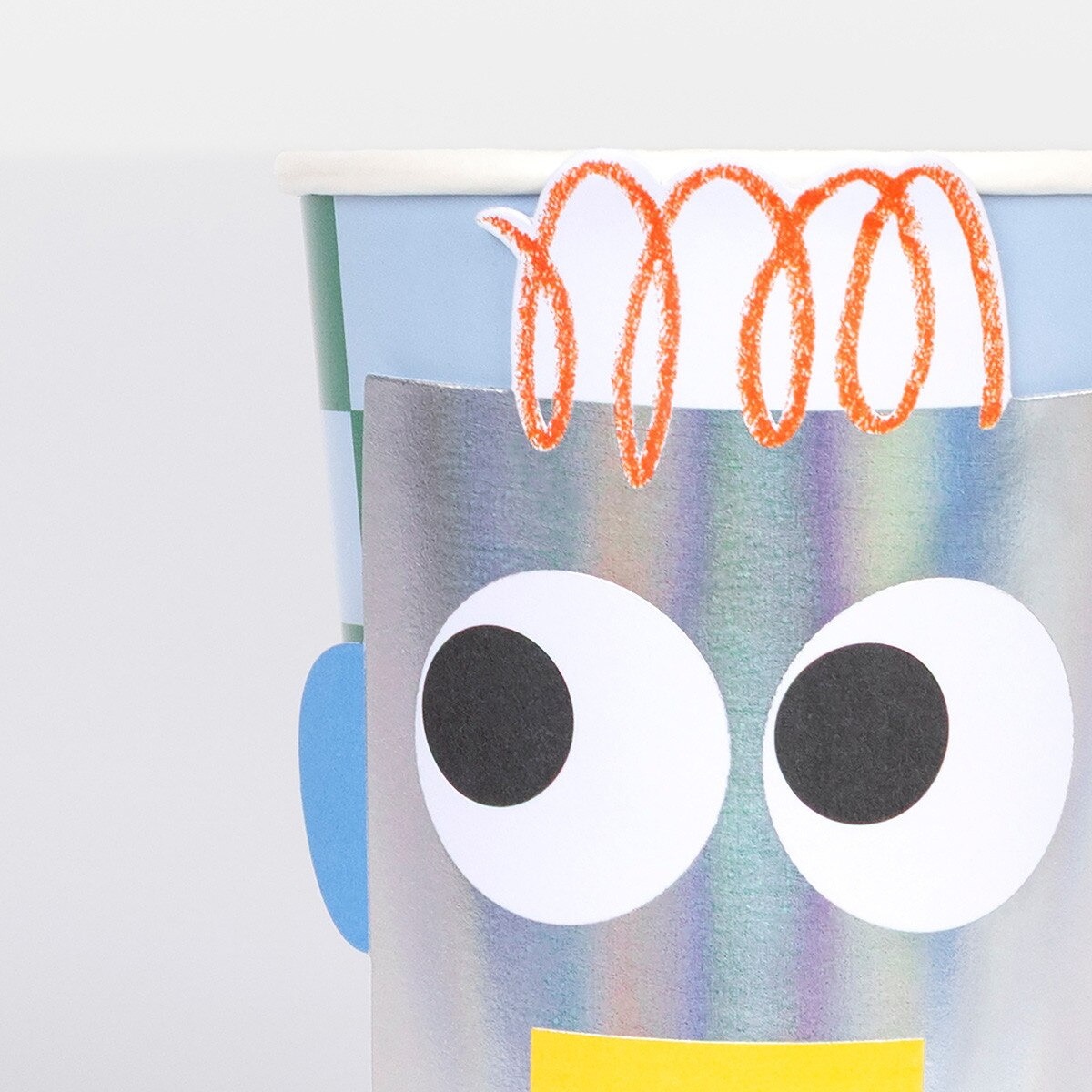 Silver robot themed paper cup with fun face for kids birthday from Parte Haus party supply store in Bethesda MD
