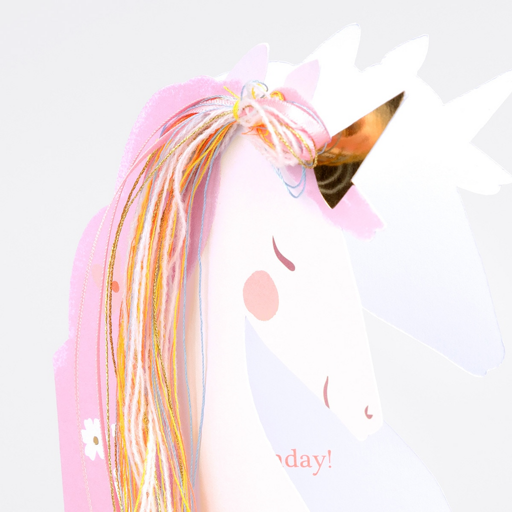 Pastel unicorn card with gold horn and rainbow string mane birthday theme from Parte Haus party supply store in Bethesda MD
