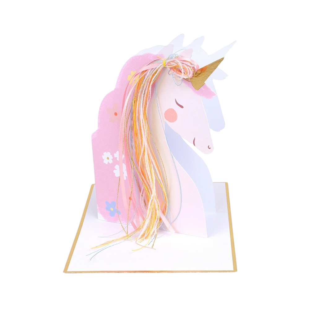 Pink unicorn centerpiece with gold horn and floral accents for birthday from Parte Haus party supply store in Bethesda MD