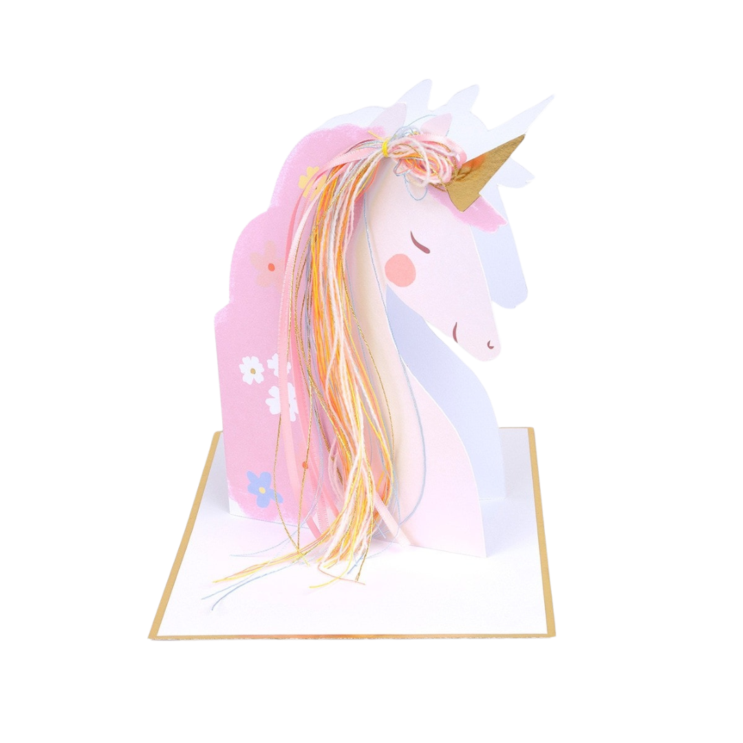 Pink unicorn centerpiece with gold horn and floral accents for birthday from Parte Haus party supply store in Bethesda MD