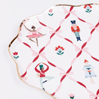 Pink Nutcracker ballet paper plate featuring dancers and toys for Christmas from Parte Haus party supply store in Bethesda Maryland