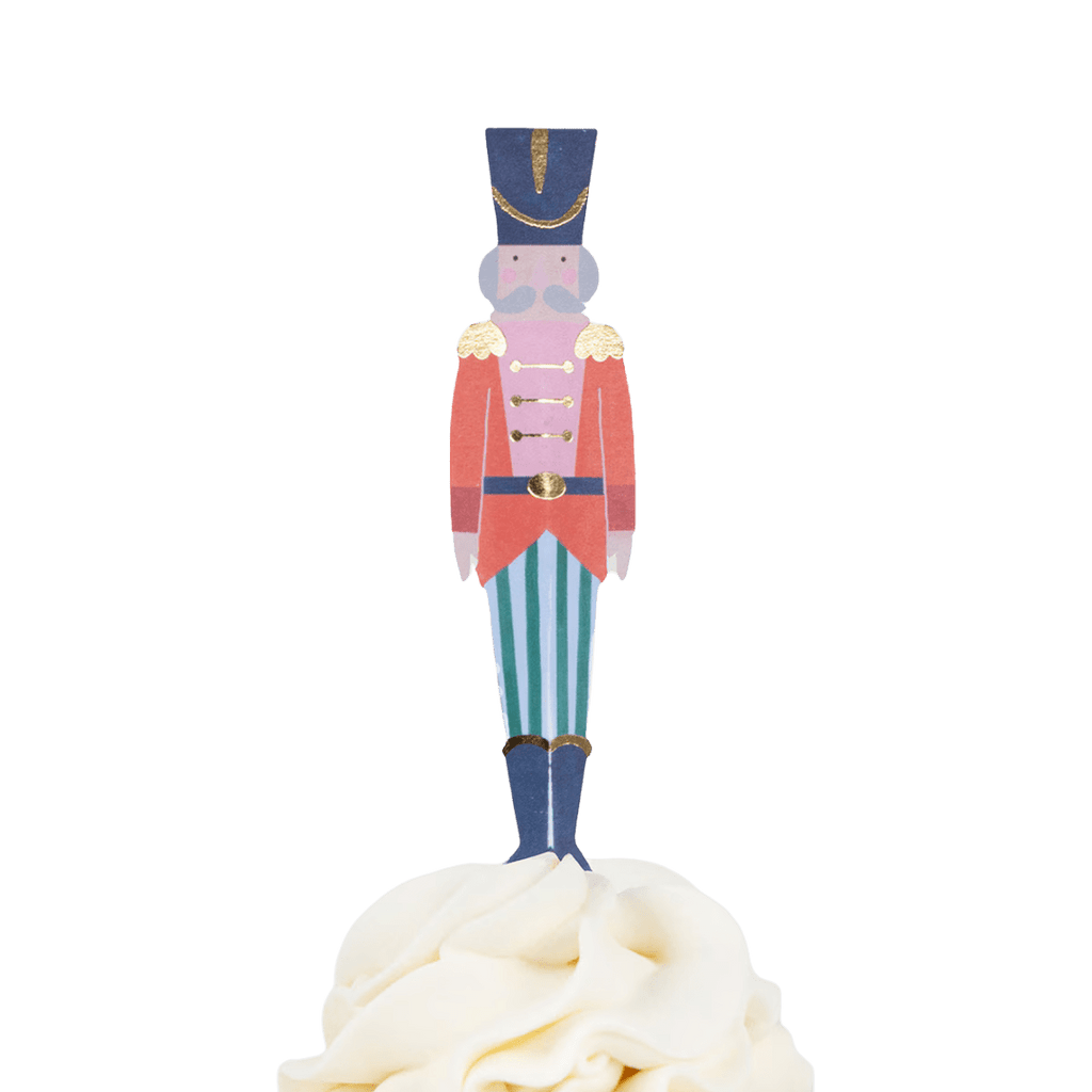 Red and blue nutcracker cupcake topper Christmas theme from Parte Haus party supply store in Bethesda MD
