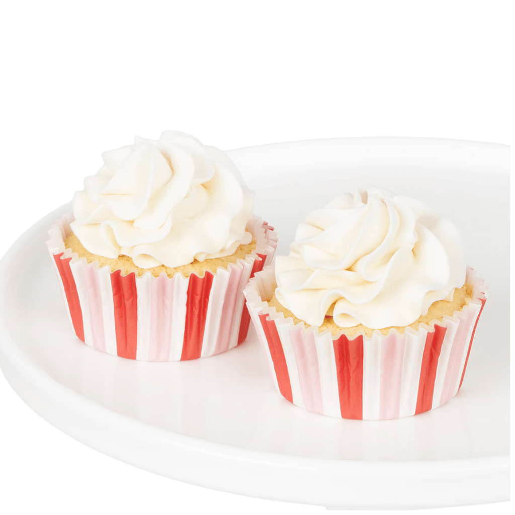 Red and white striped cupcake wrappers with cupcakes for birthdays from Parte Haus party supply store in Bethesda Maryland