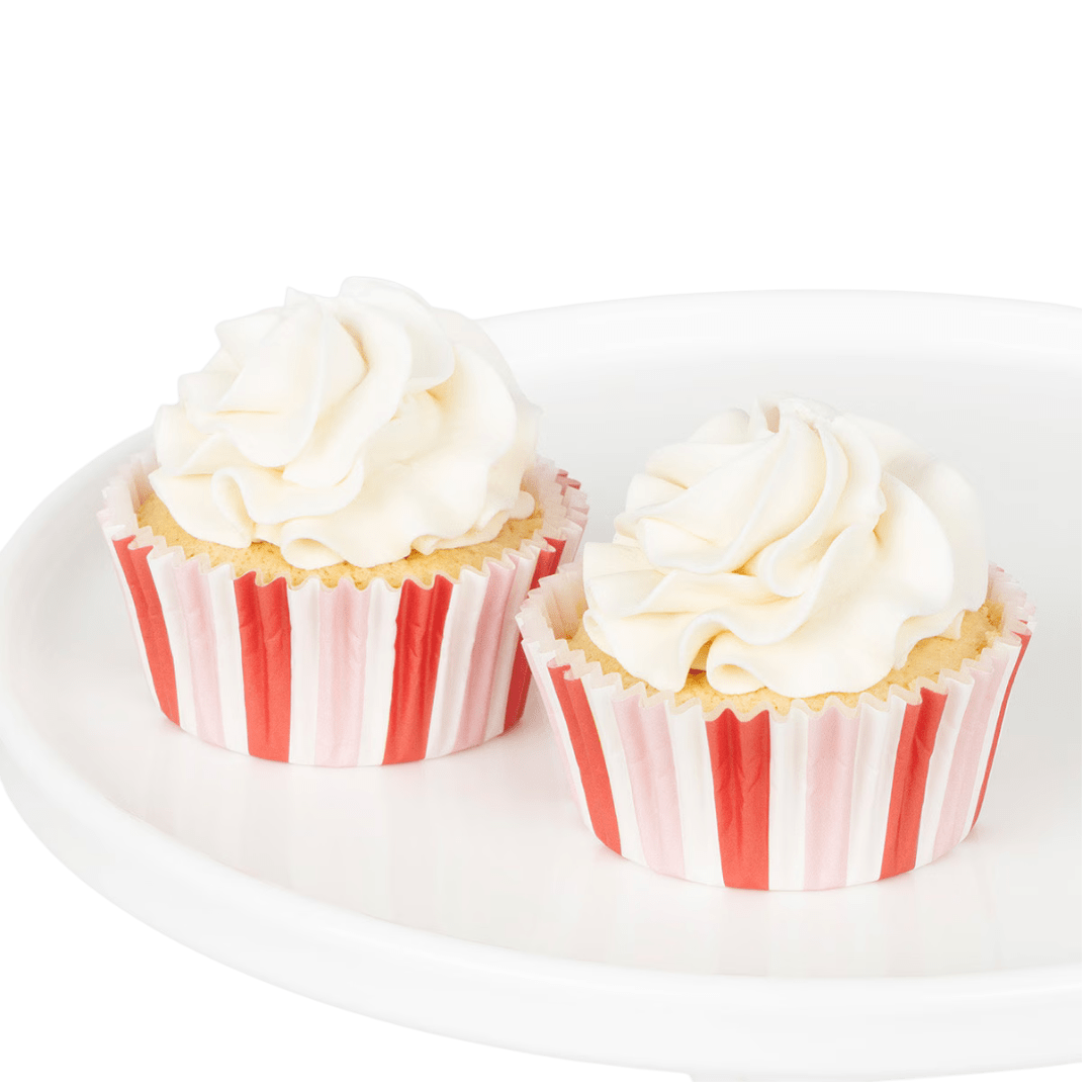Red and white striped cupcake wrappers with cupcakes for birthdays from Parte Haus party supply store in Bethesda Maryland