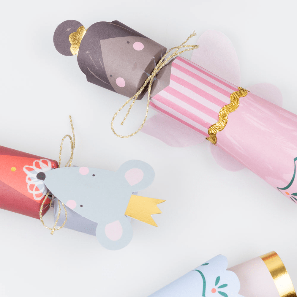Pink and red nutcracker themed Christmas crackers with character designs holiday decor from Parte Haus party supply store in Bethesda MD
