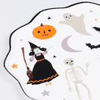 White Halloween paper plate with witch and skeleton illustrations from Parte Haus party supply store in Bethesda MD