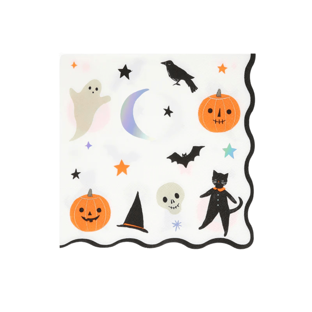 White Halloween napkin with pumpkins ghosts bats stars and a black cat from Parte Haus party supply store in Bethesda MD