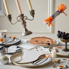 White ghost plates and pumpkin plate Halloween tableware spooky party decor from Parte Haus party supply store in Bethesda MD