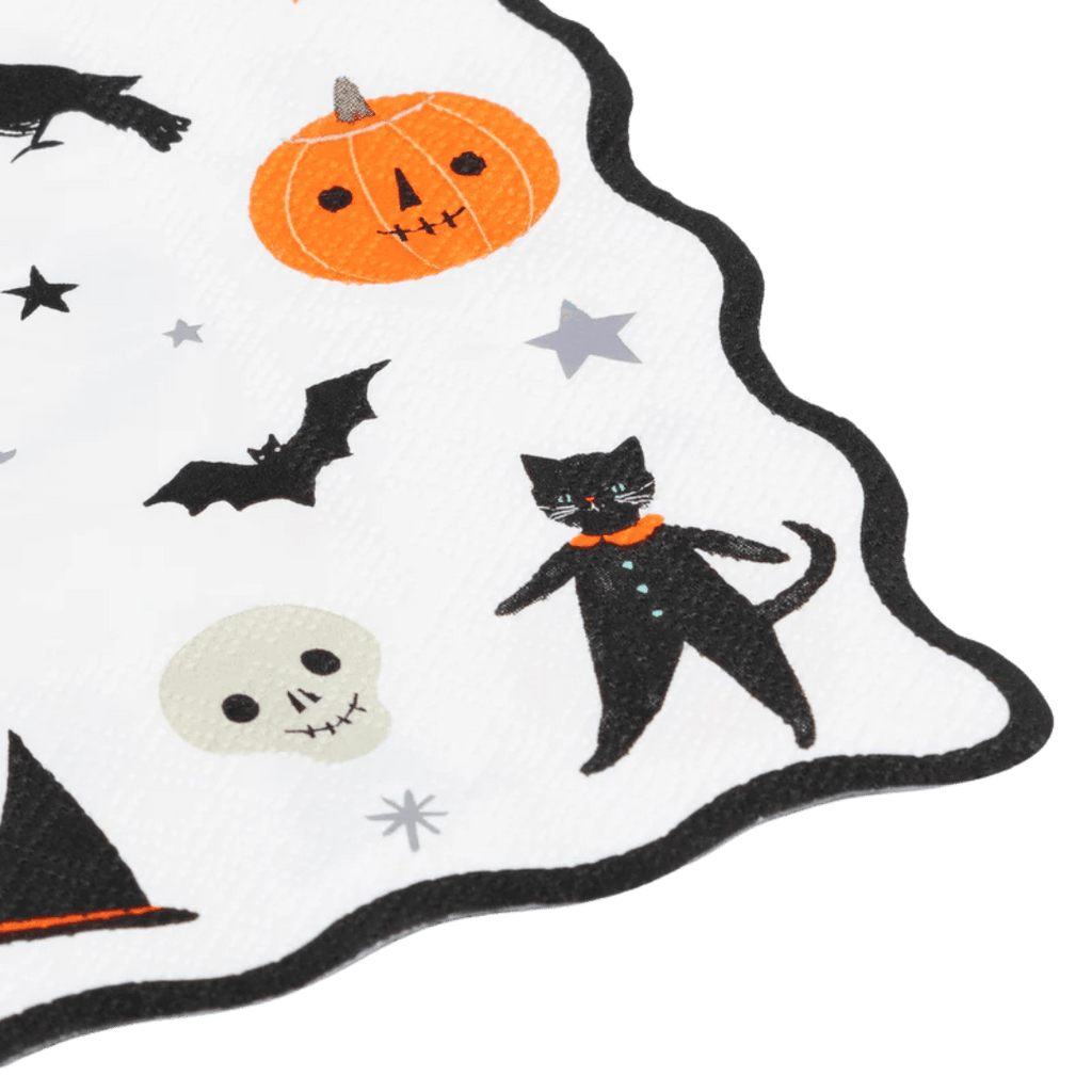 White Halloween napkin with black cat pumpkin skull and bat illustrations from Parte Haus party supply store in Bethesda MD