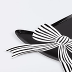 Black and white bow shaped plate with stripes modern celebration from Parte Haus party supply store in Bethesda Maryland