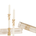Ivory gold bow taper candles elegant decor for celebration from Parte Haus party supply store in Bethesda MD