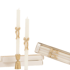 Ivory gold bow taper candles elegant decor for celebration from Parte Haus party supply store in Bethesda MD